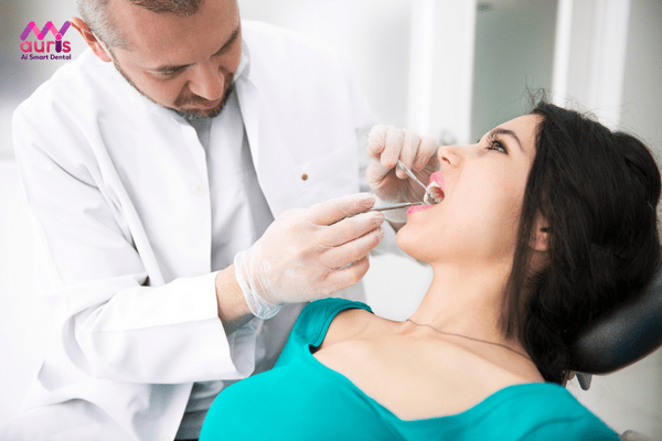 Phải làm thế nào khi chữa tủy răng bị đau?