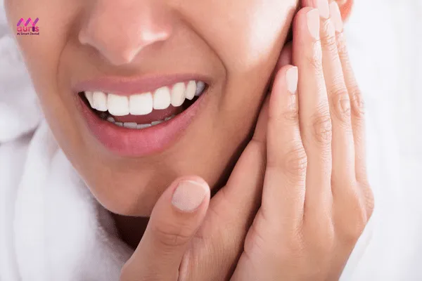 triệu chứng sau khi bọc răng sứ