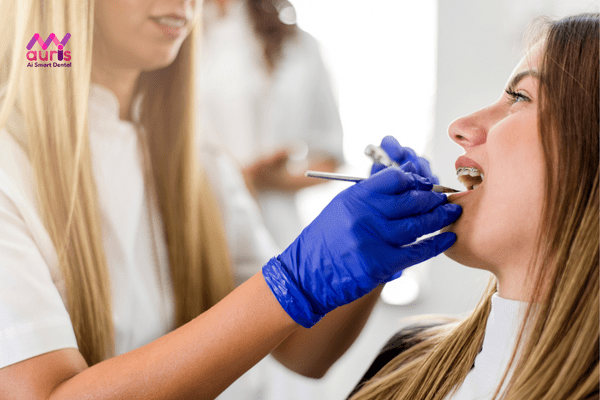 Tay nghề bác sĩ là một trong những yếu tố gây đau khi niềng răng 